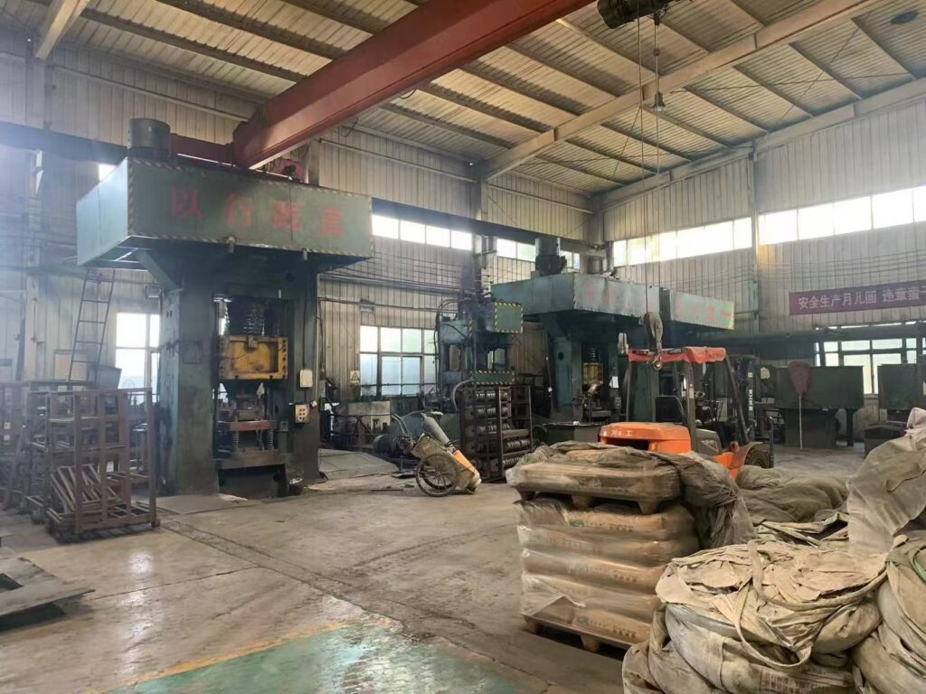 the pressing machine in our slide gate plate plant